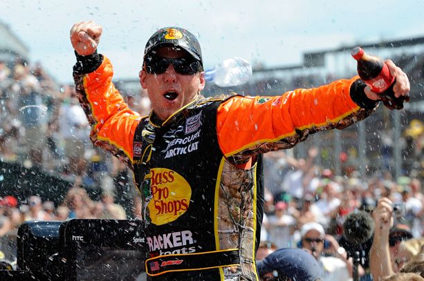 Jamie McMurray celebrates his Brickyard 400 victory at Indianapolis Motor Speedway. He became the third driver to win the Brickyard and the Daytona 500 in the same season. Credit: John Harrelson/Getty Images for NASCAR